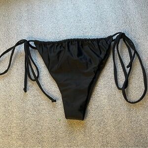 Black String Brazilian Bikini Bottoms from Miss Behavin Celebrity Fasion by Hera